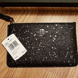 100% authentic coach star wristlet with tags!